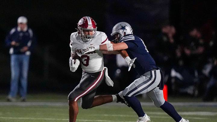 Farragut's Harrison Smith (1) tackles Oak Ridge's Malik Howard (3) during a TSSAA high school football game between Farragut and Oak Ridge High School on Oct. 23, 2025. Farragut's Harrison Smith (1) tackles Oak Ridge's Malik Howard (3) during a TSSAA high school football game between Farragut and Oak Ridge High School on Oct. 23, 2025.