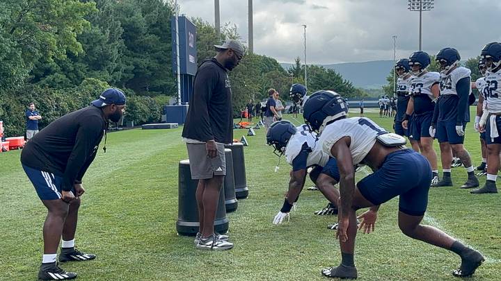 Penn State defensive linemen run through a drill at Nittany Lions practice outside Holuba Hall. Penn State defensive linemen run through a drill at Nittany Lions practice outside Holuba Hall.
