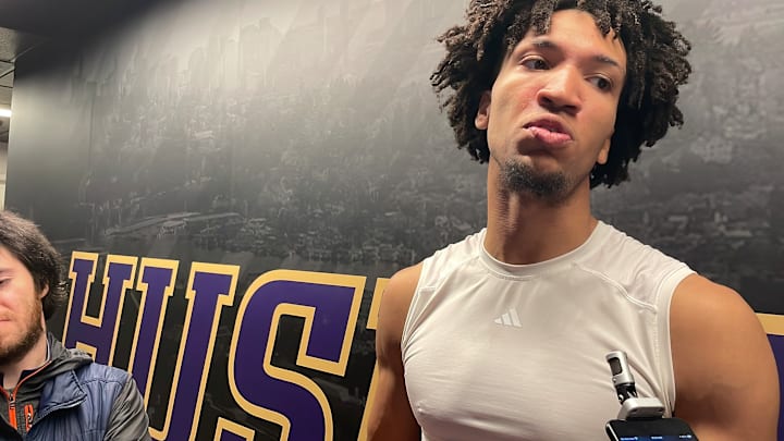 Desmond Claude meets with the media. 