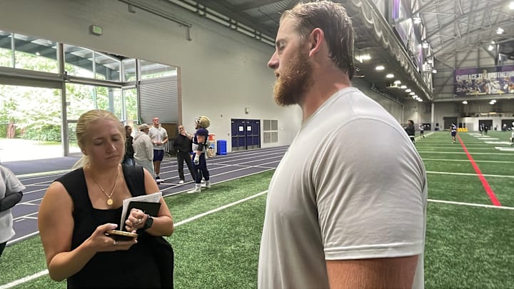 Carver Willis answer post-practice questions in Dempsey Indoor. Carver Willis answer post-practice questions in Dempsey Indoor.