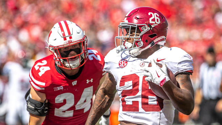 Alabama running back Jam Miller (26) runs a touchdown from Wisconsin Hunter Wohler during the game at Camp Randall Stadium in Madison, Wis. on Saturday, September 14, 2024.