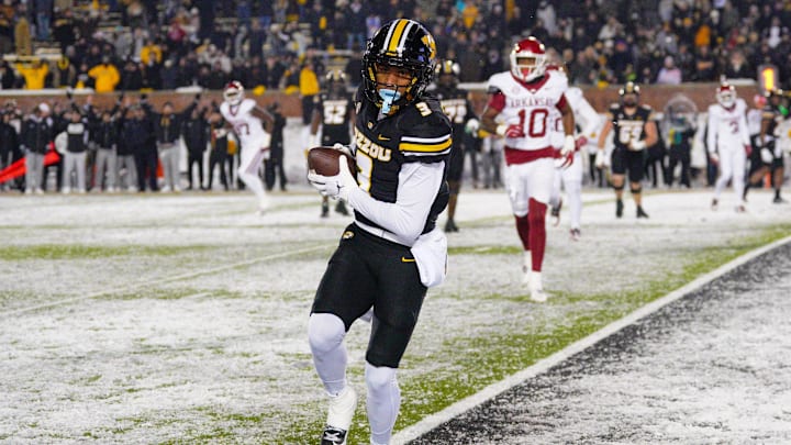 Nov 30, 2024; Columbia, Missouri, USA; Missouri Tigers wide receiver Luther Burden III (3) catches a pass for a two-point conversion against the Arkansas Razorbacks during the second half at Faurot Field at Memorial Stadium.  