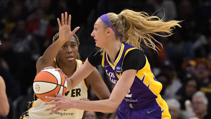 May 24, 2024; Los Angeles, California, USA;  Indiana Fever forward NaLyssa Smith (1) defends Los Angeles Sparks forward Cameron Brink (22) in the first half at Crypto.com Arena. Mandatory Credit: Jayne Kamin-Oncea-Imagn Images