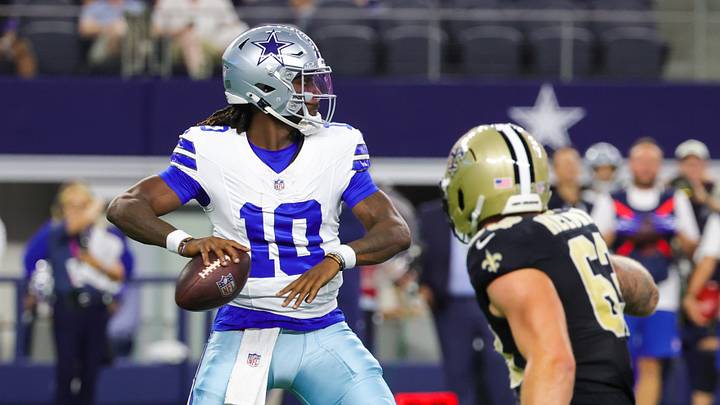 Dallas Cowboys quarterback Joe Milton III (10) throws past New Orleans Saints defensive end Michael Heldman (63) during the first half at AT&T Stadium.