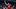 Los Angeles Clippers guard Darius Garland passes around Toronto Raptors center Jakob Poeltl. Los Angeles Clippers guard Darius Garland passes around Toronto Raptors center Jakob Poeltl.