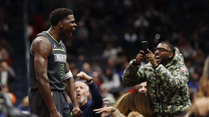 Jan 13, 2025; Washington, District of Columbia, USA; Minnesota Timberwolves guard Anthony Edwards (5) celebrates after scoring while being fouled against the Washington Wizards in the fourth quarter at Capital One Arena. Mandatory Credit: Geoff Burke-Imagn Images