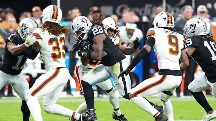 Sep 29, 2024; Paradise, Nevada, USA; Las Vegas Raiders running back Alexander Mattison (22) rushes against the Cleveland Browns during the fourth quarter at Allegiant Stadium. Mandatory Credit: Stephen R. Sylvanie-Imagn Images