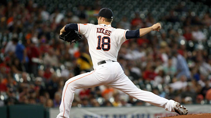 Aug 6, 2013; Houston, TX, USA; Houston Astros starting pitcher Jordan Lyles (18) pitches during the first inning against the Boston Red Sox at Minute Maid Park. 
