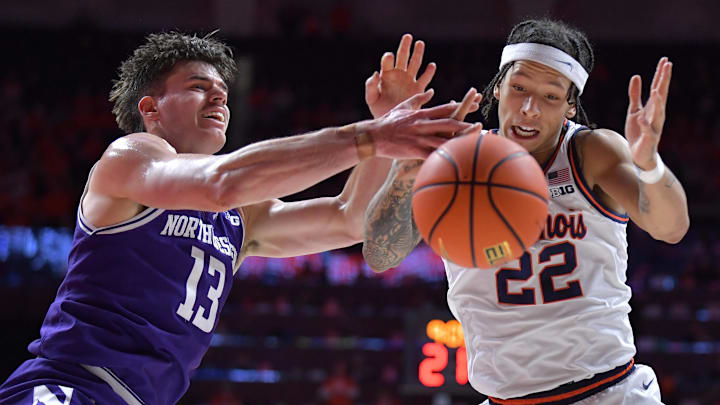 Jan 26, 2025; Champaign, Illinois, USA;  Northwestern Wildcats guard Brooks Barnhizer (13) and Illinois Fighting Illini guard Tre White (22) vie for a loose ball during the first half at State Farm Center. Mandatory Credit: Ron Johnson-Imagn Images