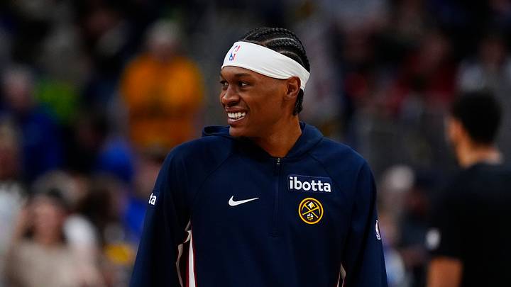 Denver Nuggets guard Peyton Watson (8) smiles before the game against the Portland Trail Blazers at Ball Arena on Mar. 22, 2026.