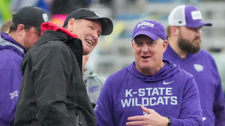 Lawrence, Kansas, USA; Kansas Jayhawks head coach Lance Leipold, left, talks with Kansas State Wildcats head coach Chris Klieman prior to a game at David Booth Kansas Memorial Stadium.