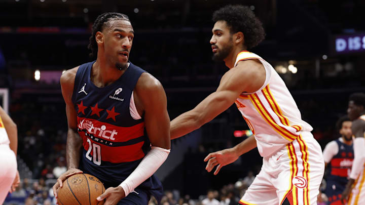 Nov 25, 2025; Washington, District of Columbia, USA; Washington Wizards center Alex Sarr (20) holds the ball as Atlanta Hawks forward Jacob Toppin (0) defends in the second half at Capital One Arena. Mandatory Credit: Geoff Burke-Imagn Images Nov 25, 2025; Washington, District of Columbia, USA; Washington Wizards center Alex Sarr (20) holds the ball as Atlanta Hawks forward Jacob Toppin (0) defends in the second half at Capital One Arena. Mandatory Credit: Geoff Burke-Imagn Images