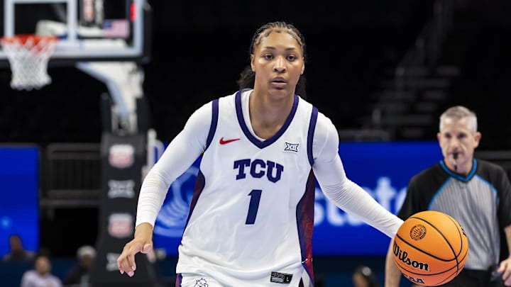 Mar 6, 2026; Kansas City, MO, USA; TCU Horned Frogs guard Taylor Bigby (1) dribbles the ball upcourt against the BYU Cougars during the first half at T-Mobile Center. Mandatory Credit: Nick Tre. Smith-Imagn Images