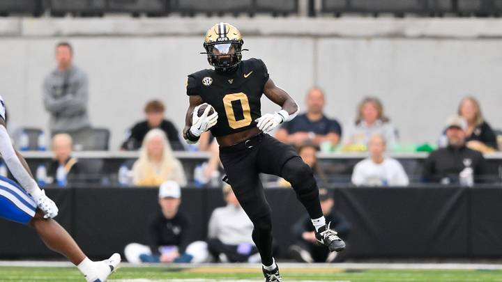 Nov 22, 2025; Nashville, Tennessee, USA; Vanderbilt Commodores wide receiver Junior Sherrill (0) runs with the ball after a made catch against the Kentucky Wildcats during the first half at FirstBank Stadium. Mandatory Credit: Steve Roberts-Imagn Images Nov 22, 2025; Nashville, Tennessee, USA; Vanderbilt Commodores wide receiver Junior Sherrill (0) runs with the ball after a made catch against the Kentucky Wildcats during the first half at FirstBank Stadium. Mandatory Credit: Steve Roberts-Imagn Images