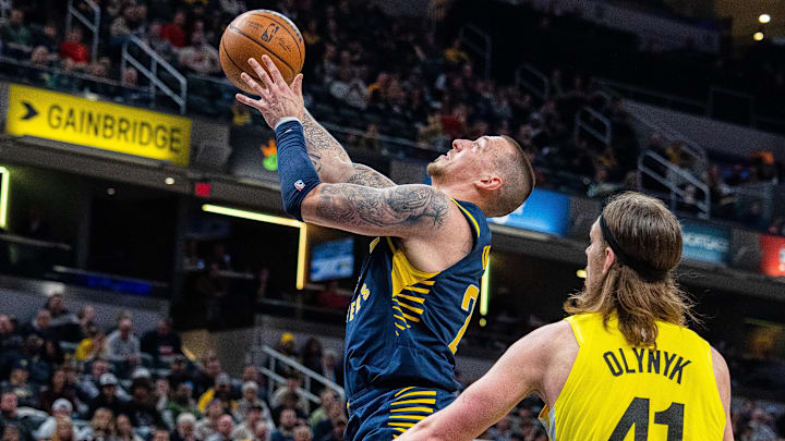 Feb 13, 2023; Indianapolis, Indiana, USA; Indiana Pacers center Daniel Theis (27) shoots the ball while Utah Jazz forward Kelly Olynyk (41) defends in the second half at Gainbridge Fieldhouse. Mandatory Credit: Trevor Ruszkowski-Imagn Images Feb 13, 2023; Indianapolis, Indiana, USA; Indiana Pacers center Daniel Theis (27) shoots the ball while Utah Jazz forward Kelly Olynyk (41) defends in the second half at Gainbridge Fieldhouse. Mandatory Credit: Trevor Ruszkowski-Imagn Images