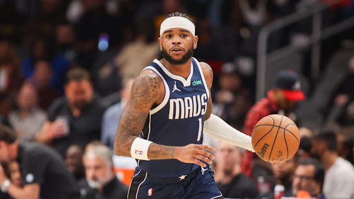 Nov 25, 2024; Atlanta, Georgia, USA; Dallas Mavericks guard Jaden Hardy (1) dribbles against the Atlanta Hawks in the first quarter at State Farm Arena. Mandatory Credit: Brett Davis-Imagn Images