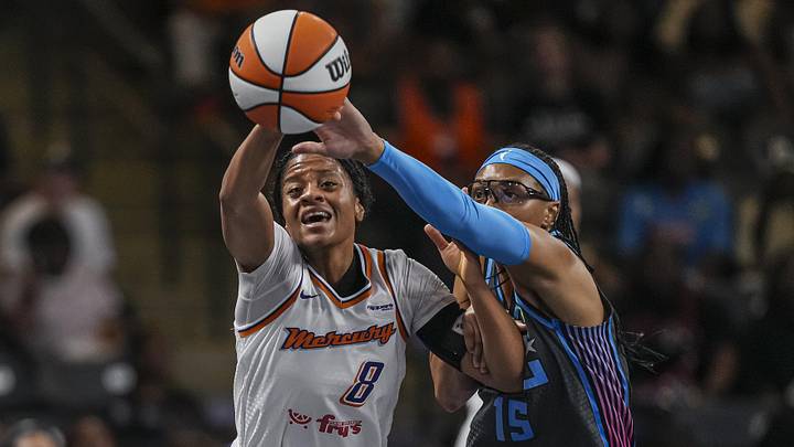 Aug 1, 2025; College Park, Georgia, USA; Phoenix Mercury guard Monique Akoa Makani (8) and Atlanta Dream guard Allisha Gray (15) battle for the ball during the first half at Gateway Center Arena at College Park. Mandatory Credit: Dale Zanine-Imagn Images