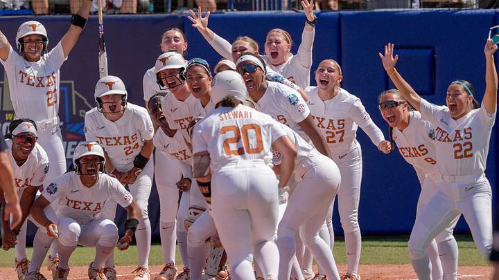 Texas celebrates Texas utility Katie Stewart (20) hitting a three-run home run in the sixth inning during a softball game at the Women’s College World Series between Texas and Nebraska at Devon Park in Oklahoma City, on Sunday, May 31, 2026.