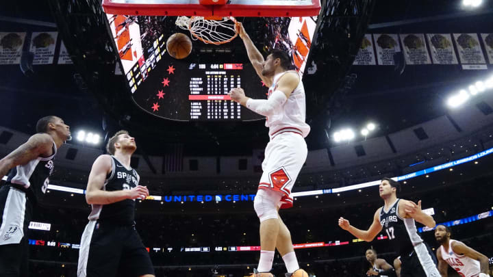 Chicago Bulls center Nikola Vucevic (9) dunks the ball against the San Antonio Spurs during the second half at United Center. Chicago Bulls center Nikola Vucevic (9) dunks the ball against the San Antonio Spurs during the second half at United Center.
