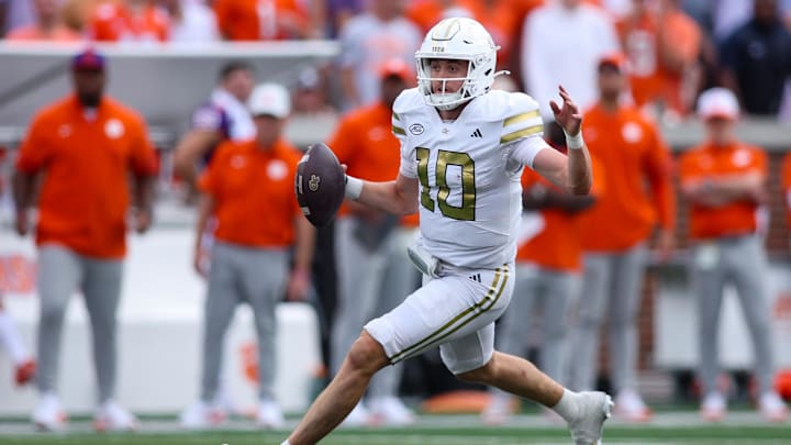 Sep 13, 2025; Atlanta, Georgia, USA; Georgia Tech Yellow Jackets quarterback Haynes King (10) scrambles against the Clemson Tigers in the third quarter at Bobby Dodd Stadium at Hyundai Field. Mandatory Credit: Brett Davis-Imagn Images