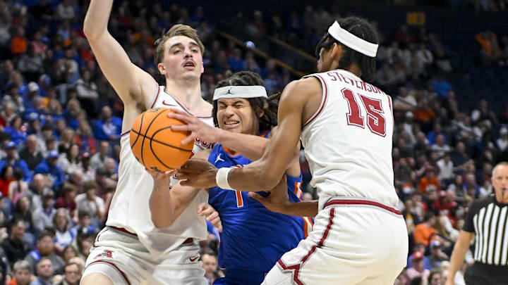 Mar 15, 2024; Nashville, TN, USA; Alabama Crimson Tide forward Grant Nelson (2) and forward Jarin Stevenson (15) foul Florida Gators guard Walter Clayton Jr. (1) during the first half at Bridgestone Arena. Mandatory Mar 15, 2024; Nashville, TN, USA; Alabama Crimson Tide forward Grant Nelson (2) and forward Jarin Stevenson (15) foul Florida Gators guard Walter Clayton Jr. (1) during the first half at Bridgestone Arena. Mandatory