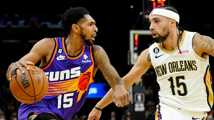 Suns Cameron Payne (15) drives against Pelicans Jose Alvarado (15) during a game at Footprint Center on Oct. 28, 2022.