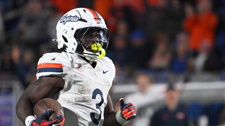 Nov 15, 2025; Durham, North Carolina, USA;  Virginia Cavaliers running back J'Mari Taylor (3) scores a touchdown against the Duke Blue Devils during the third quarter at Wallace Wade Stadium. Mandatory Credit: Zachary Taft-Imagn Images