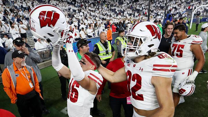 Wisconsin safety Grant Dean (16) and wide receiver Dorsett Stecker celebrate after beating Penn State.