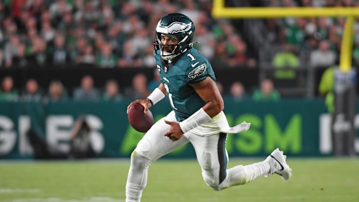 Sep 16, 2024; Philadelphia, Pennsylvania, USA; Philadelphia Eagles quarterback Jalen Hurts (1) runs with the football against the Atlanta Falcons at Lincoln Financial Field. 