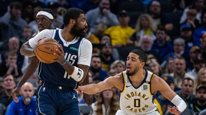 Feb 25, 2024; Indianapolis, Indiana, USA; Dallas Mavericks guard Kyrie Irving (11) holds the ball while Indiana Pacers guard Tyrese Haliburton (0) defends in the first half at Gainbridge Fieldhouse. Mandatory Credit: Trevor Ruszkowski-USA TODAY Sports Feb 25, 2024; Indianapolis, Indiana, USA; Dallas Mavericks guard Kyrie Irving (11) holds the ball while Indiana Pacers guard Tyrese Haliburton (0) defends in the first half at Gainbridge Fieldhouse. Mandatory Credit: Trevor Ruszkowski-USA TODAY Sports