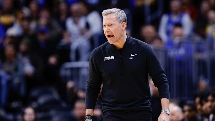 Mar 20, 2025; Denver, CO, USA; VCU Rams head coach Ryan Odom reacts during the first half against the Brigham Young Cougars in the first round of the NCAA Tournament at Ball Arena. Mandatory Credit: Isaiah J. Downing-Imagn Images Mar 20, 2025; Denver, CO, USA; VCU Rams head coach Ryan Odom reacts during the first half against the Brigham Young Cougars in the first round of the NCAA Tournament at Ball Arena. Mandatory Credit: Isaiah J. Downing-Imagn Images