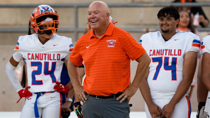 Canutillo head football coach Scott Brooks smiles on the sideline during the Eagles’ season opener against Pebble Hills on Friday, Aug. 29, 2025, at the SAC (Socorro ISD Student Activities Complex) in El Paso, Texas.