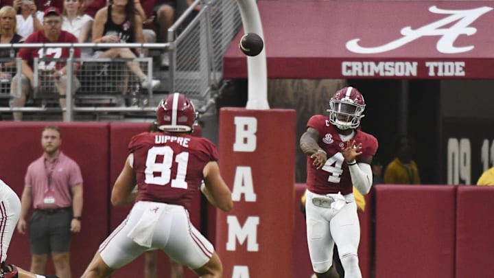 Aug 31, 2024; Tuscaloosa, Alabama, USA;  Alabama Crimson Tide quarterback Jalen Milroe (4) throws to tight end CJ Dippre (81) against the Western Kentucky Hilltoppers during the first half at Bryant-Denny Stadium.  Mandatory Credit: Gary Cosby Jr.-Imagn Images