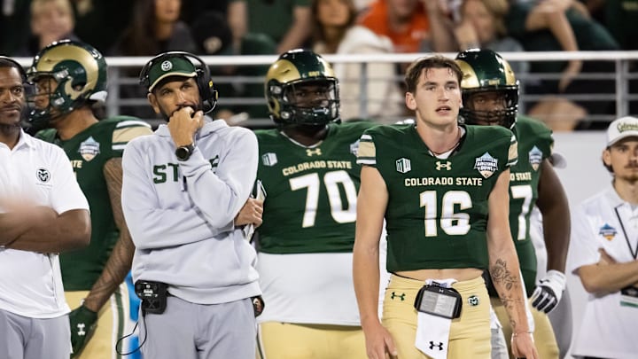 Dec 28, 2024; Tucson, AZ, USA; Colorado State Rams head coach Jay Norvell and quarterback Brayden Fowler-Nicolosi (16) against the Miami (OH) RedHawks during the Snoop Dogg Arizona Bowl at Arizona Stadium. Mandatory Credit: Mark J. Rebilas-Imagn Images
