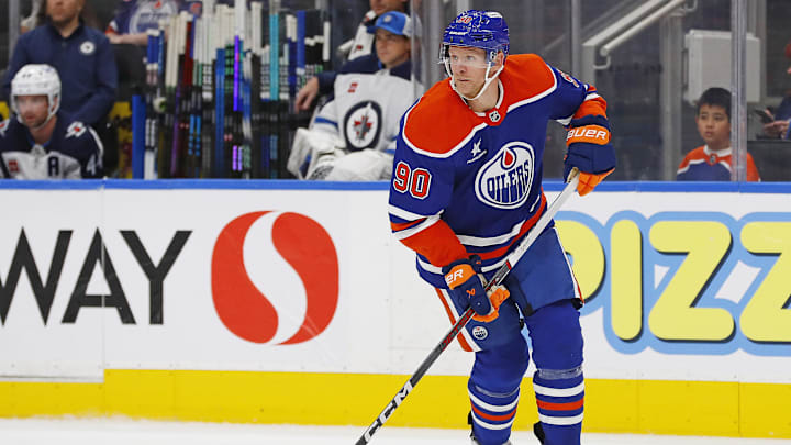 Oct 9, 2024; Edmonton, Alberta, CAN; Edmonton Oilers forward Corey Perry (90) looks for a pass against the Winnipeg Jets at Rogers Place. Mandatory Credit: Perry Nelson-Imagn Images