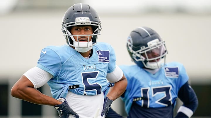Tennessee Titans wide receiver Elic Ayomanor (5) watches his teammates during an NFL football training camp practice at Ascension Saint Thomas Sports Park in Nashville, Tenn., Sunday, Aug. 3, 2025.