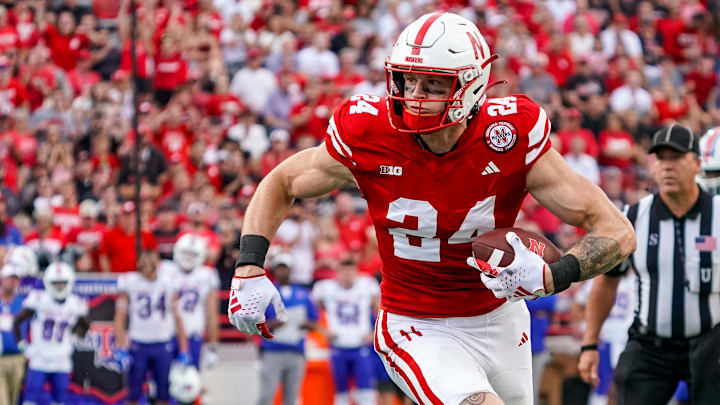 Sep 23, 2023; Lincoln, Nebraska, USA; Nebraska Cornhuskers tight end Thomas Fidone II (24) runs for a touchdown against the Louisiana Tech Bulldogs during the fourth quarter at Memorial Stadium. Sep 23, 2023; Lincoln, Nebraska, USA; Nebraska Cornhuskers tight end Thomas Fidone II (24) runs for a touchdown against the Louisiana Tech Bulldogs during the fourth quarter at Memorial Stadium.