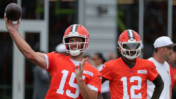 Joe Flacco throws as Shedeur Sanders looks on during Browns training camp July 25, 2025, in Berea, Ohio.