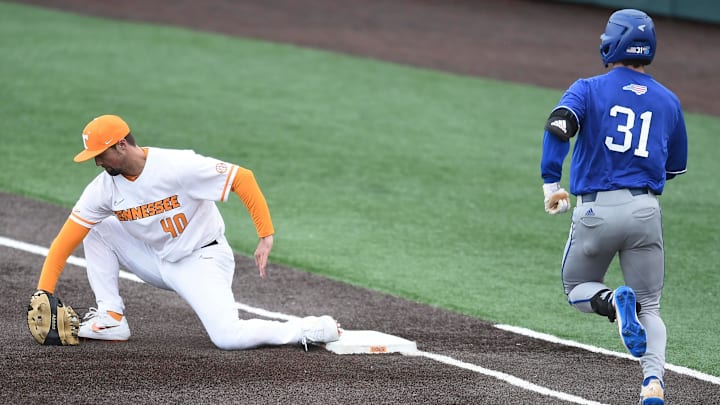 UNC Asheville's Dominic Freeberger is forced at first base by Tennessee's Luc Lipcius in the NCAA baseball game on Wednesday, February 26, 2020.
Kns Tn Unc Asheville UNC Asheville's Dominic Freeberger is forced at first base by Tennessee's Luc Lipcius in the NCAA baseball game on Wednesday, February 26, 2020.
Kns Tn Unc Asheville