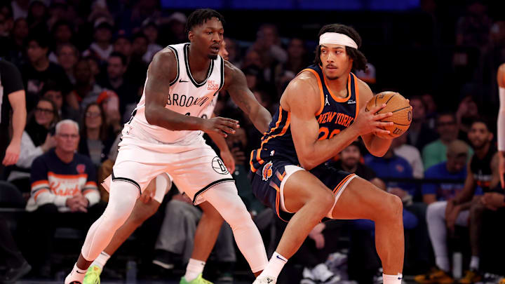 Nov 15, 2024; New York, New York, USA; New York Knicks center Jericho Sims (20) controls the ball against Brooklyn Nets forward Dorian Finney-Smith (28) during the first quarter at Madison Square Garden. Mandatory Credit: Brad Penner-Imagn Images Nov 15, 2024; New York, New York, USA; New York Knicks center Jericho Sims (20) controls the ball against Brooklyn Nets forward Dorian Finney-Smith (28) during the first quarter at Madison Square Garden. Mandatory Credit: Brad Penner-Imagn Images