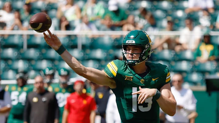 Sep 13, 2025; Waco, Texas, USA; Baylor Bears quarterback Sawyer Robertson (13) throws the balll upfield against the Samford Bulldogs during the first half at McLane Stadium. Mandatory Credit: Chris Jones-Imagn Images