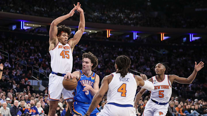 Nov 13, 2022; New York, New York, USA; Oklahoma City Thunder guard Josh Giddey (3) looks to make a pass while being defended by New York Knicks center Jericho Sims (45), and guards Derrick Rose (4) and Immanuel Quickley (5) in the fourth quarter at Madison Square Garden. Mandatory Credit: Wendell Cruz-Imagn Images