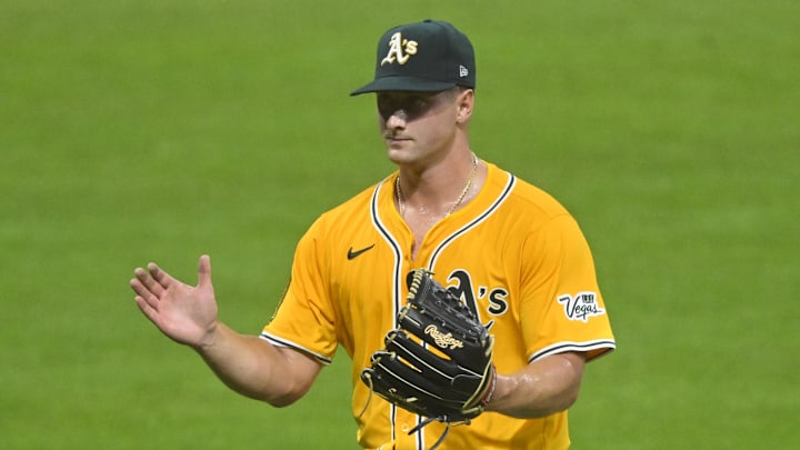 Jul 19, 2025; Cleveland, Ohio, USA; Athletics relief pitcher Jack Perkins (50) reacts as he walks off the field in the seventh inning against the Cleveland Guardians at Progressive Field. Mandatory Credit: David Richard-Imagn Images Jul 19, 2025; Cleveland, Ohio, USA; Athletics relief pitcher Jack Perkins (50) reacts as he walks off the field in the seventh inning against the Cleveland Guardians at Progressive Field. Mandatory Credit: David Richard-Imagn Images
