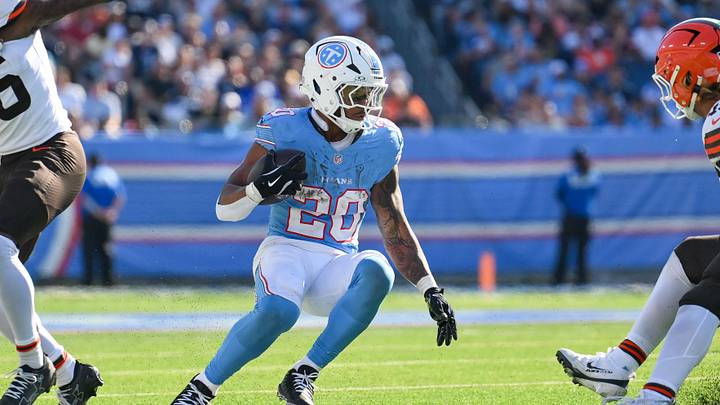 Oct 25, 2026; Nashville, Tennessee, USA;  Tennessee Titans running back Tony Pollard (20) cuts back against the Cleveland Browns during the second half at Nissan Stadium. Mandatory Credit: Steve Roberts-Imagn Images