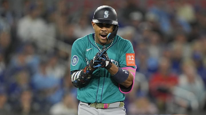 Oct 19, 2025; Toronto, Ontario, CAN; Seattle Mariners center fielder Julio Rodriguez (44) reacts after walking in the third inning against the Toronto Blue Jays during game six of the ALCS round for the 2025 MLB playoffs at Rogers Centre. Mandatory Credit: John E. Sokolowski-Imagn Images