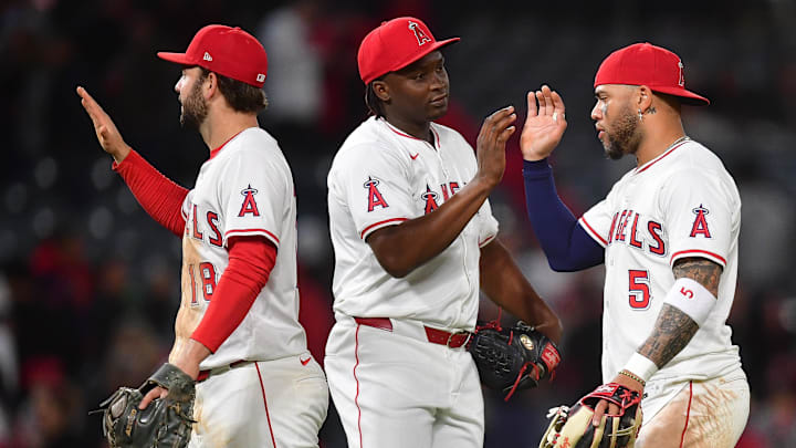 May 6, 2025; Anaheim, California, USA; Los Angeles Angels first baseman Nolan Schanuel (18) pitcher Jose Fermin (68) and third baseman Yoan Moncada (5) celebrate the victory against the Toronto Blue Jays at Angel Stadium. Mandatory Credit: Gary A. Vasquez-Imagn Images May 6, 2025; Anaheim, California, USA; Los Angeles Angels first baseman Nolan Schanuel (18) pitcher Jose Fermin (68) and third baseman Yoan Moncada (5) celebrate the victory against the Toronto Blue Jays at Angel Stadium. Mandatory Credit: Gary A. Vasquez-Imagn Images