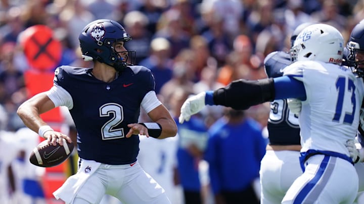Aug 30, 2025; East Hartford, Connecticut, USA; Connecticut Huskies quarterback Joe Fagnano (2) throws a pass against the Central Connecticut State Blue Devils in the first half at Pratt & Whitney Stadium at Rentschler Field. Mandatory Credit: David Butler II-Imagn Images