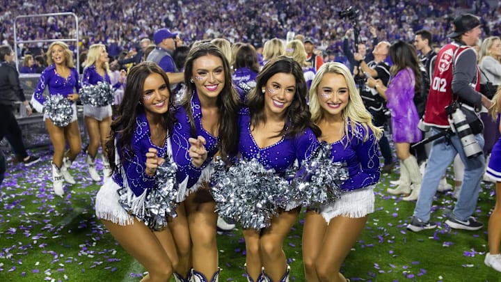 Dec 31, 2022; Glendale, Arizona, USA; TCU Horned Frogs cheerleaders celebrate after defeating the Michigan Wolverines during the 2022 Fiesta Bowl at State Farm Stadium. Mandatory Credit: Mark J. Rebilas-Imagn Images