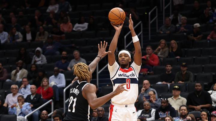 Oct 12, 2026; Washington, District of Columbia, USA; Washington Wizards guard Bilal Coulibaly (0) shoots the ball over Brooklyn Nets forward Noah Clowney (21) in the second half at Capital One Arena. Mandatory Credit: Geoff Burke-Imagn Images