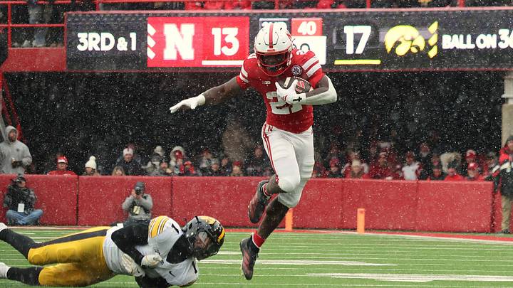 Emmett Johnson rushes against Iowa. Emmett Johnson rushes against Iowa.